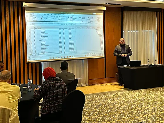 Presenting an implementation plan to a room of attendees